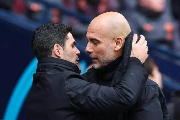 1727059402195019657.jpg arteta guardiola.jpg